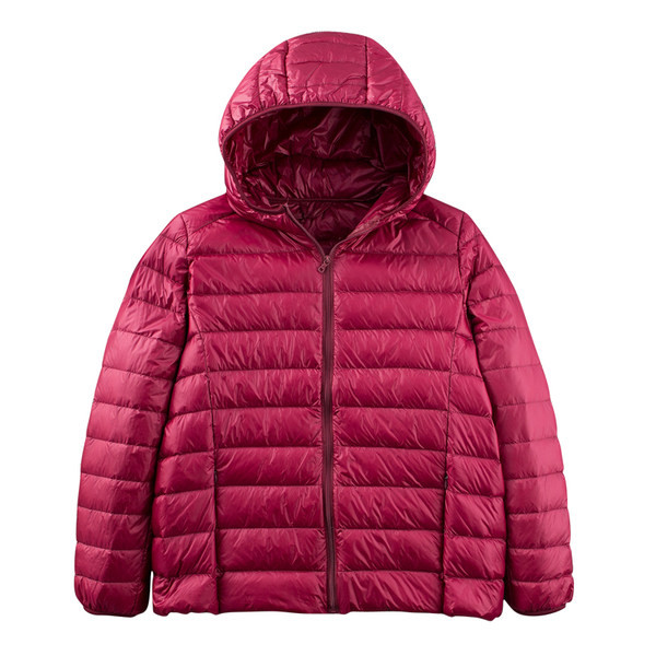 Egyszínű női kabát kapucnival és cipzárral