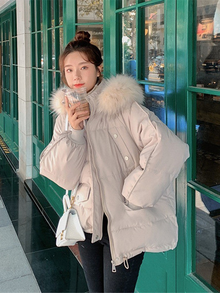 Női téli kabát kapucnival és gumival