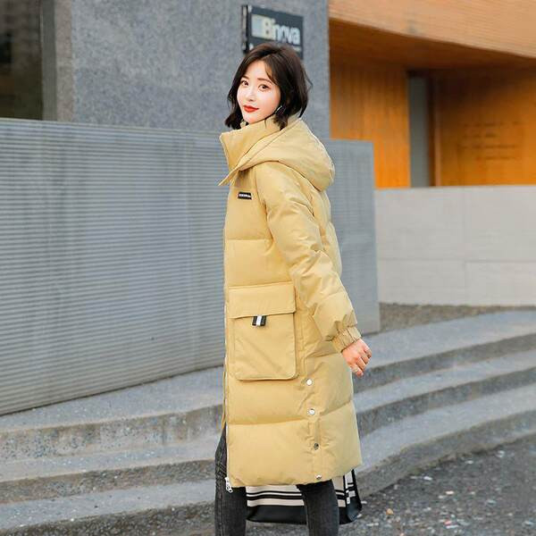 Meleg téli melegítő hosszú modell oldalsó gombokkal