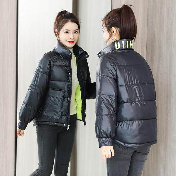 Női alkalmi kabát magas gallérral, fekete-fehér színben