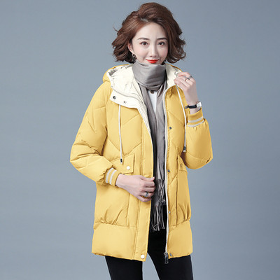 Női őszi-téli kabát cipzárral és gombokkal