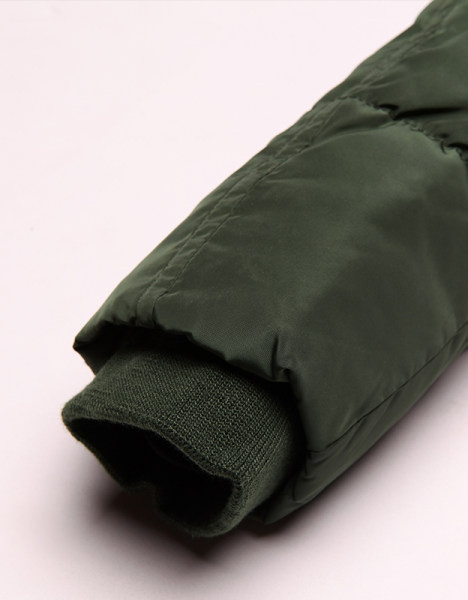 Női téli kabát zöld színű kapucnival