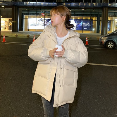 Női alkalmi kabát széles modell kapucnival