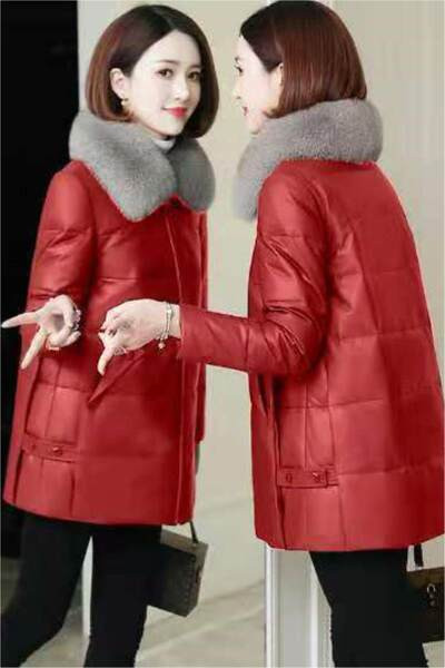 Női téli kabát széles modell, tollal