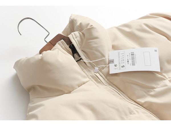 Stílusos női rövid kabát sima modell cipzárral