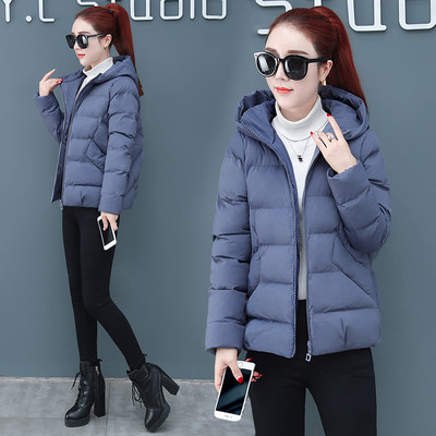 Női modern kabát sima modell cipzárral és kapucnival