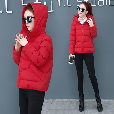 Női modern kabát sima modell cipzárral és kapucnival