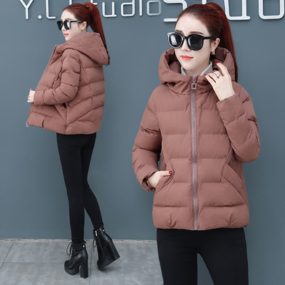 Női modern kabát sima modell cipzárral és kapucnival