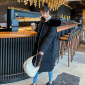 Hosszú női kabát pehely kapucnival