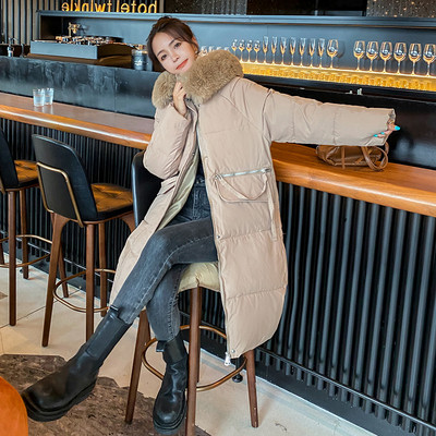 Hosszú női kabát pehely kapucnival