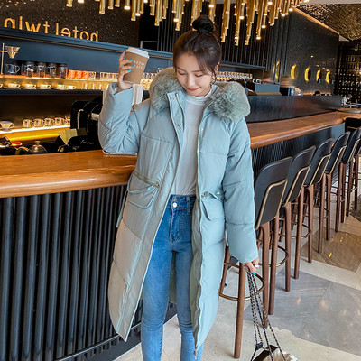 Hosszú női kabát pehely kapucnival