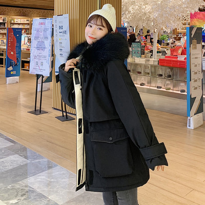 Női téli kabát zsebekkel - széles modell