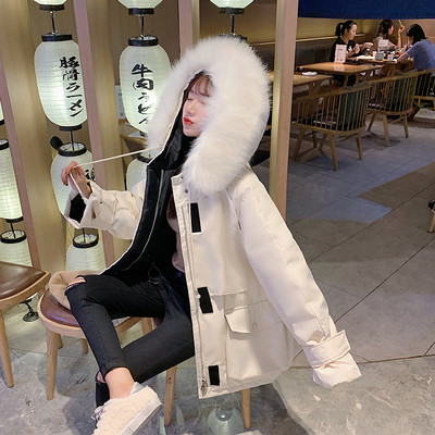 Női téli kabát zsebekkel - széles modell