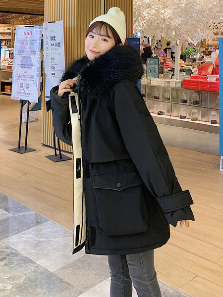 Női téli kabát zsebekkel - széles modell