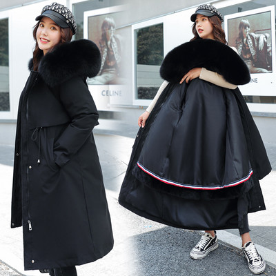 Hosszú női téli kabát fűzővel és kapucnival