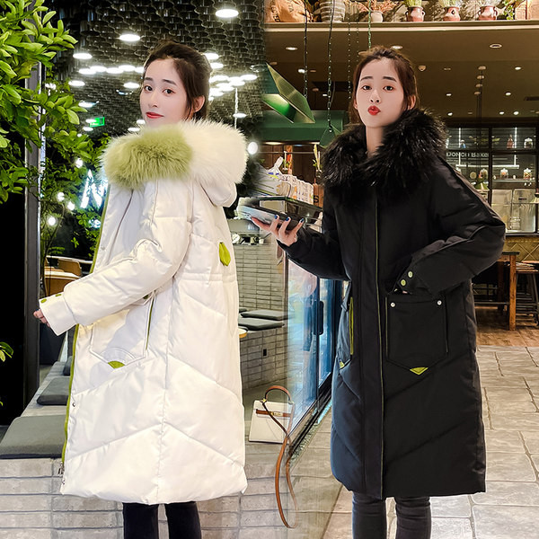 Hosszú női téli kabát tollas gallérral