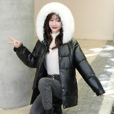 Alkalmi téli kabát kapucnival és mély zsebekkel nőknek