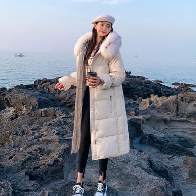 Hosszú meleg női kabát, pehely kapucnival