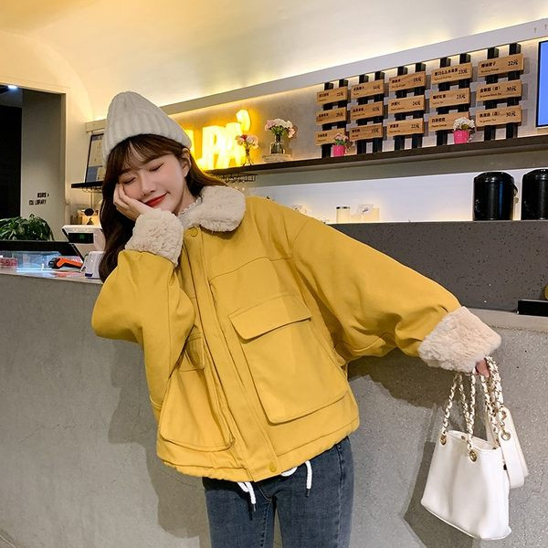 Női széles kabát klasszikus gallérral és vastag béléssel