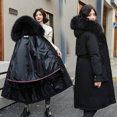 Női hosszú, széles kabát kapucnival és pehellyel