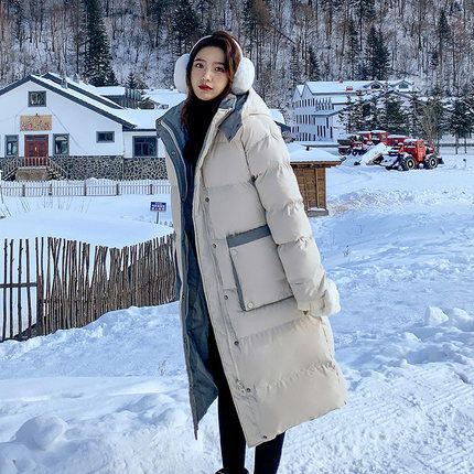 Meleg téli kabát zsebekkel és kapucnival - hosszú modell