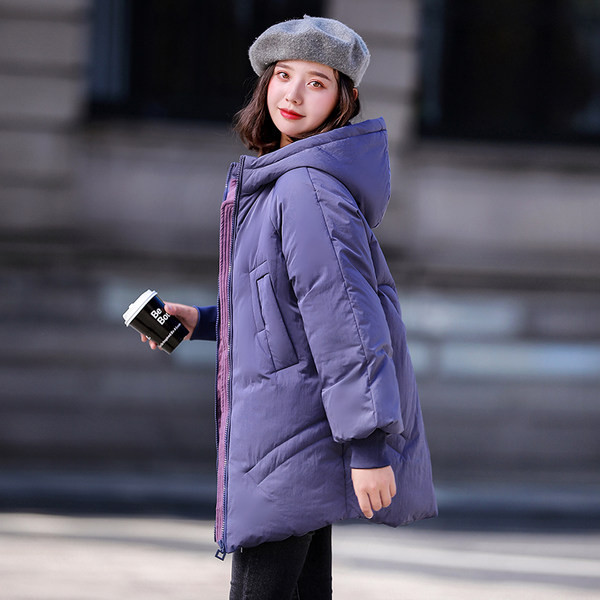 Alkalmi női kabát kapucnival és cipzárral