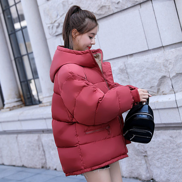 Őszi-téli női kabát cipzárral és kapucnival