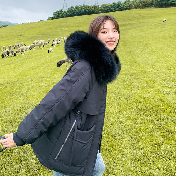 Női alkalmi kabát eco pehelyszínnel és mély zsebekkel