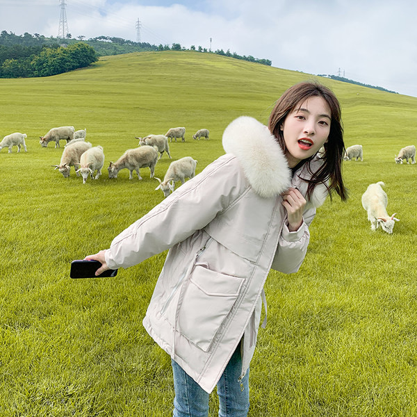 Női alkalmi kabát eco pehelyszínnel és mély zsebekkel