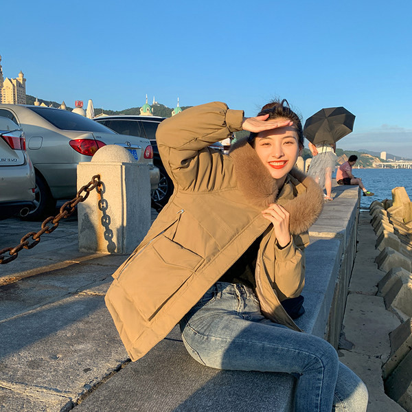 Női alkalmi kabát eco pehelyszínnel és mély zsebekkel