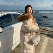 Modern téli kabát kapucnival, pehelytal