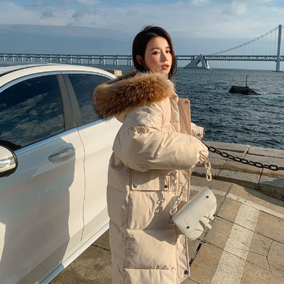 Modern téli kabát kapucnival, pehelytal