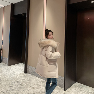 Stílusos női kabát széles modell pehelytal és kapucnival