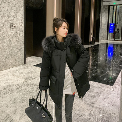 Stílusos női kabát széles modell pehelytal és kapucnival