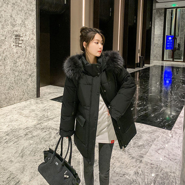 Stílusos női kabát széles modell pehelytal és kapucnival