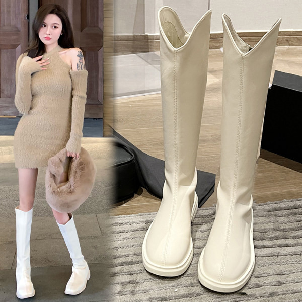 Дамски кожени  ботуши с  равна  подметка