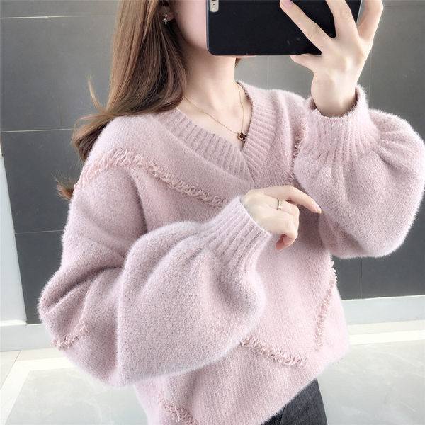 Γυναικείο φαρδύ πουλόβερ με λαιμόκοψη σε σχήμα V