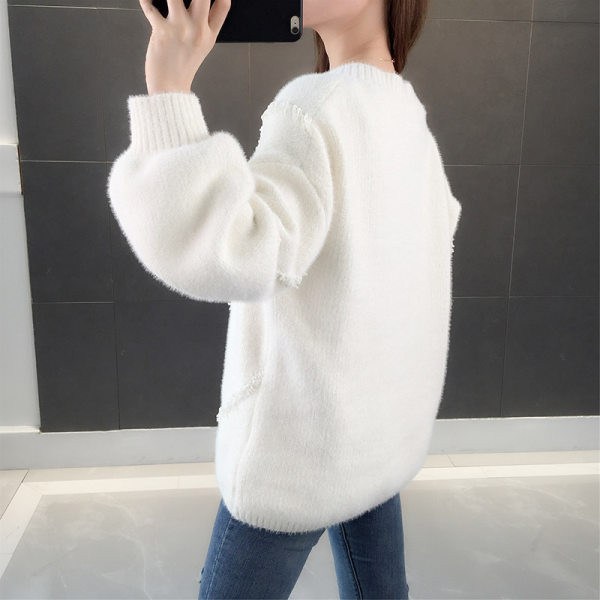 Γυναικείο φαρδύ πουλόβερ με λαιμόκοψη σε σχήμα V