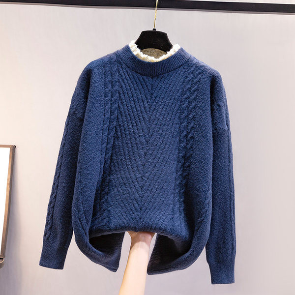 Φαρδύ γυναικείο πουλόβερ με χαμηλό γιακά