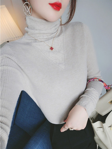 Μοντέλο γυναικείο κοτλέ πουλόβερ με ψηλό γιακά