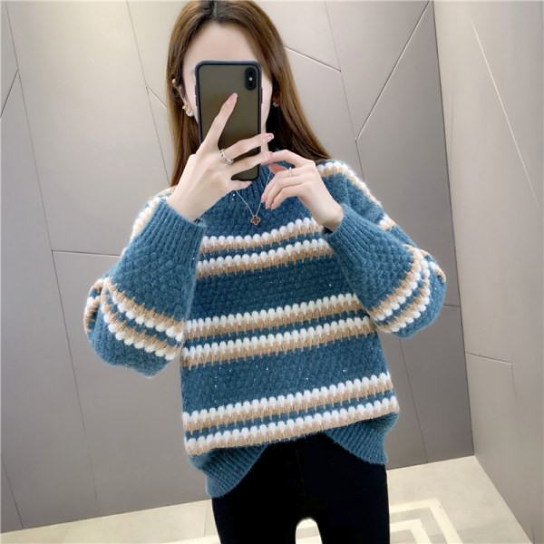 Χοντρό γυναικείο χειμωνιάτικο πουλόβερ με χαμηλό γιακά