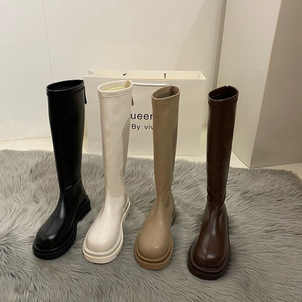 Stílusos női bőrcsizma lekerekített modell