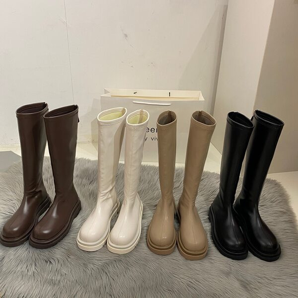 Stílusos női bőrcsizma lekerekített modell