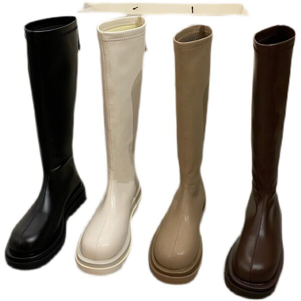 Stílusos női bőrcsizma lekerekített modell