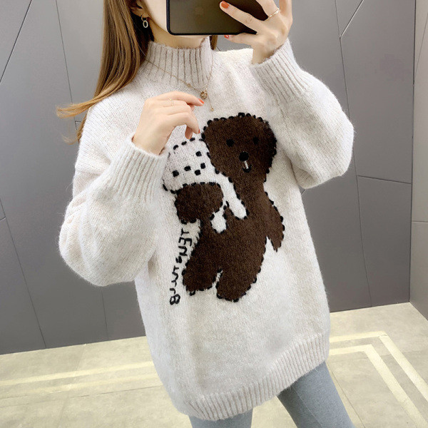 Női hosszú pulóver magas gallérral