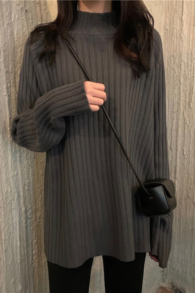 Alkalmi női széles pulóver magas gallérral