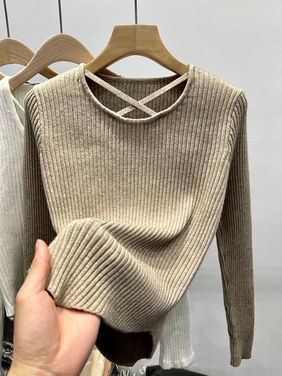 Γυναικείο πουλόβερ με βολάν με χιαστά κορδόνια