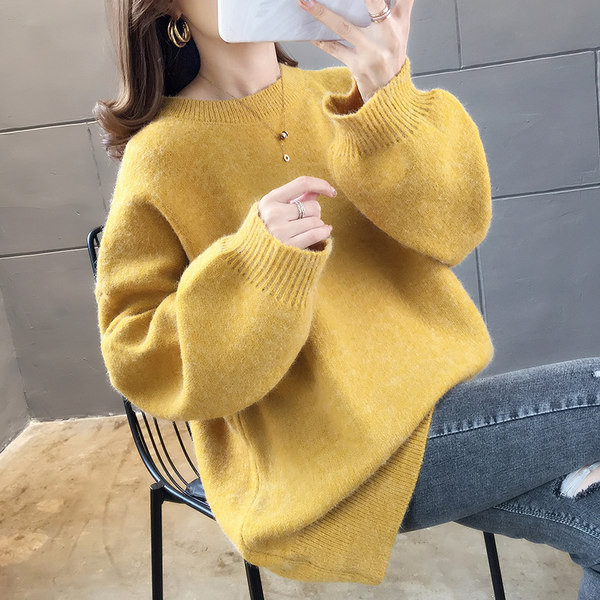 Modern női kötött pulóver, széles ujjal