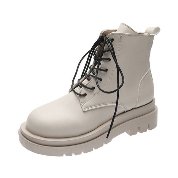 Női bőrcsizma lekerekített fűzővel