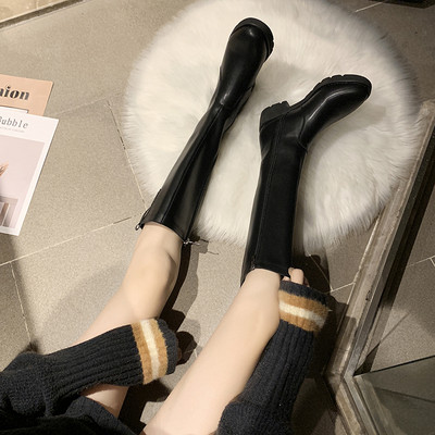 Női bőrcsizma cipzárral - fekete színű